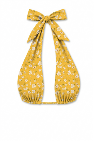 Yellow floral bikini top with a large bow on a white background