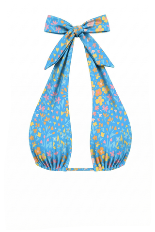 Blue bikini top with floral pattern and bow on a white background